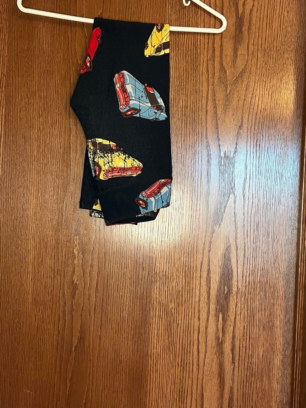 LuLaRoe Kids Black Leggings with Red, Yellow & Light Blue Car Print